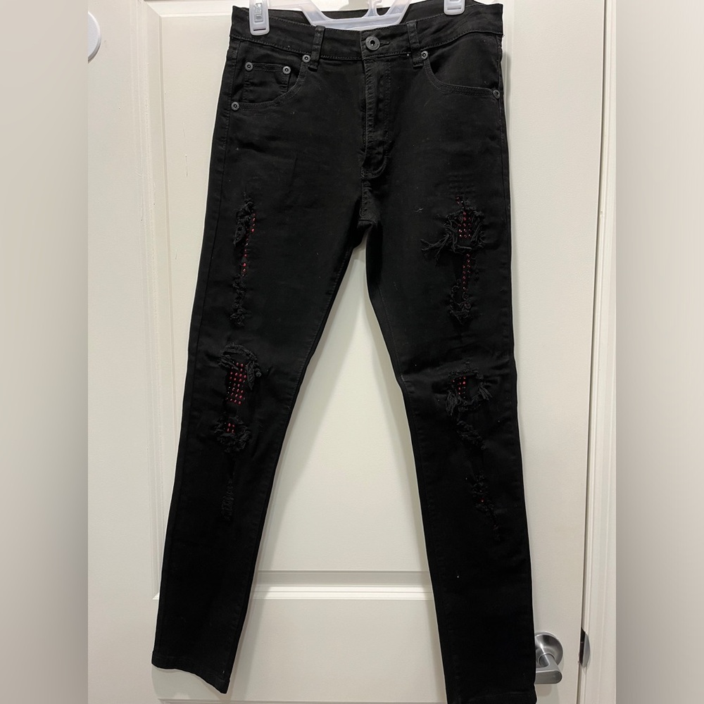 Today $9.    Black jeans distressed with red stones. Unisex New